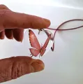Roze vlinderhanger met ketting
